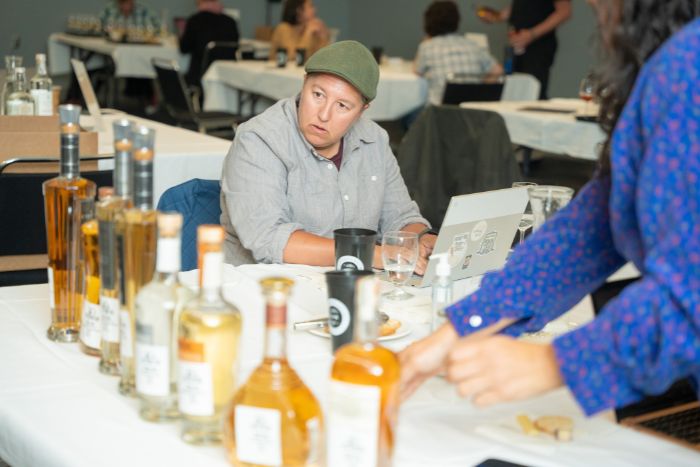 Judges evaluating package of spirits